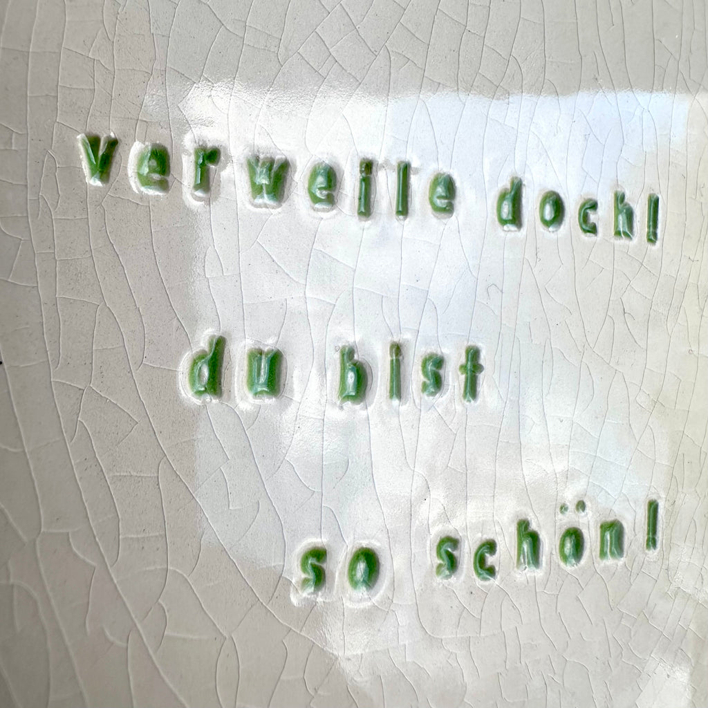 verweile doch! du bist so schön! in grüner schrift