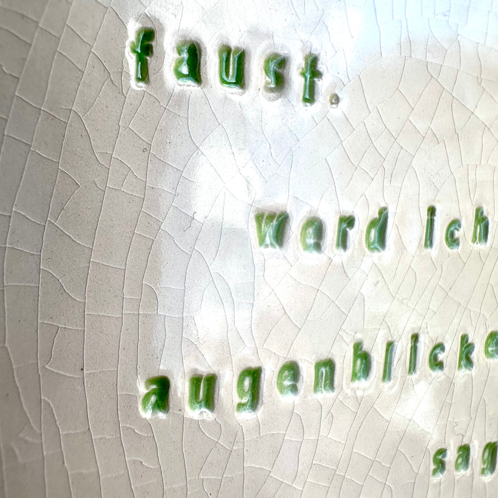 faust in grüner schrift